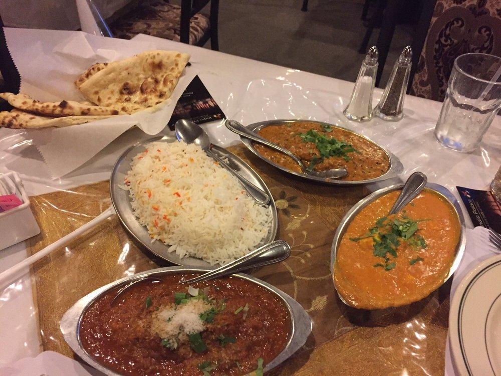 Chicken Korma · Chicken pieces cooked in a creamy sauce with nuts. Served with rice.