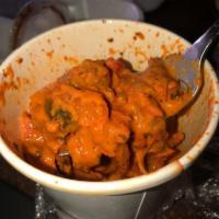 Chicken Makhani · Boneless tandoori chicken cooked in tomato and creamy sauce. Served with rice.