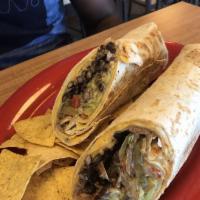 El Grande Burritos · Choice of meat, jack and cheddar cheese, black or pinto beans, rice, salsa especial, sour cr...