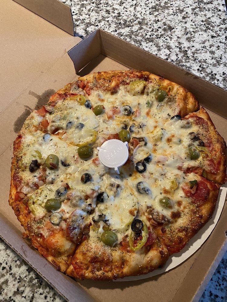 Supreme Pizza · Pepperoni, sausage, beef, ham, black and green olives, banana peppers, tomatoes, green peppers, mushrooms, and onions with fresh mozzarella and provolone cheeses.