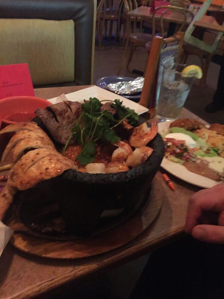 Molcajete · Hot stone bowl filled with rib-eye steak, chicken breast, shrimp, chorizo Mexican sausage, beans, cheese, and cactus served with 3 tortillas and salad.