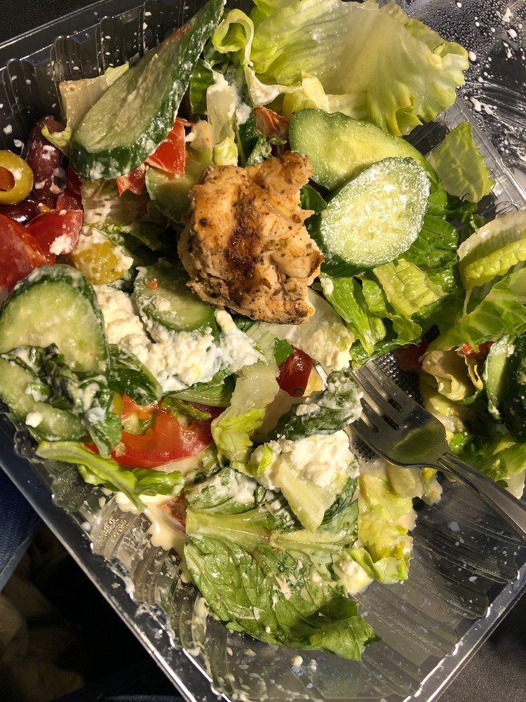 Greek Salad · Fresh romaine lettuce, crisp cucumber, ripe tomato, green olives pepperoncini rich feta cheese and our house dressing.