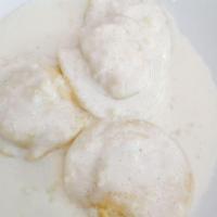 Ravioli · Choice of chicken or veal. Served with red and white sauces.
