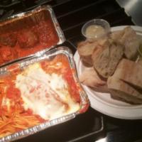 Eggplant Mama Mia · Eggplant parmigiana layered with chicken and mozzarella cheese. Includes side order of spagh...