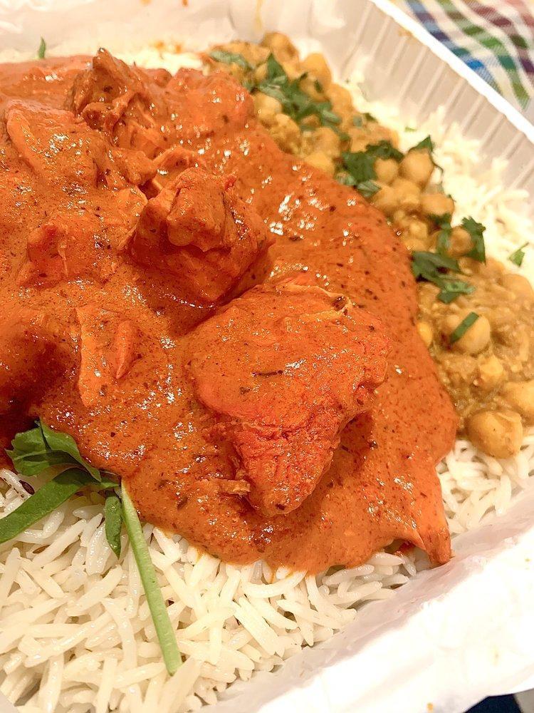 Butter Chicken Platter · Mild. Includes rice, chick peas, sprinkle of spinach and cilantro.