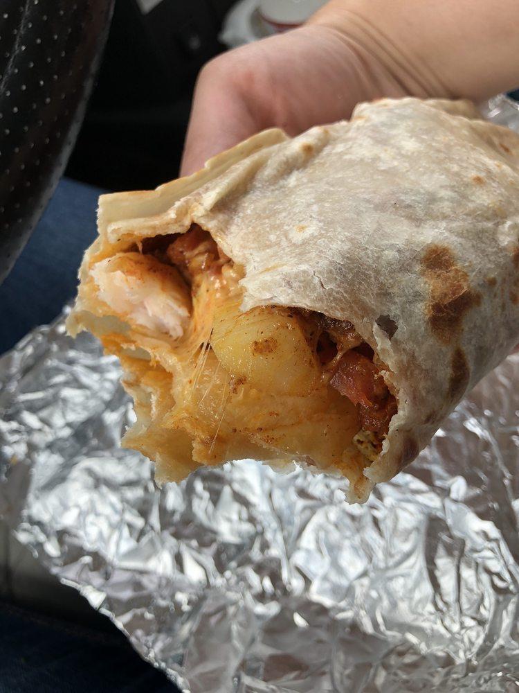Crazy Burrito · Al pastor marinated pork, shrimp, potatoes, pico de gallo and cheese.
