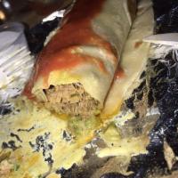 Carnitas Burrito · Pork, guacamole and pico de gallo.