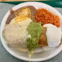Chicken Chimichanga · Inside: Chicken, beans, shredded cheese
Ontop: sour cream, guacamole, cheese dip