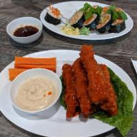 Buffalo Wings · Original buffalo wings sauce, soy sticks, serve with celery, and special sauce.