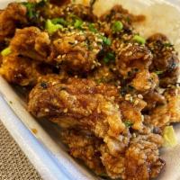 Furikake Chicken · Crispy chicken thigh bites furikake glaze. Served with 2 scoops of rice and 1 scoop macaroni...