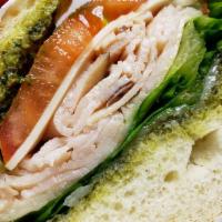 Turkey Pesto Sandwich Lunch · Melted provolone cheese, lettuce and tomato. Served on Dutch crunch or French roll.