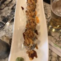 Oklahoma Roll · Spicy crab meat, cucumber on the inside, shrimp tempura, avocado with eel sauce, spicy mayo ...