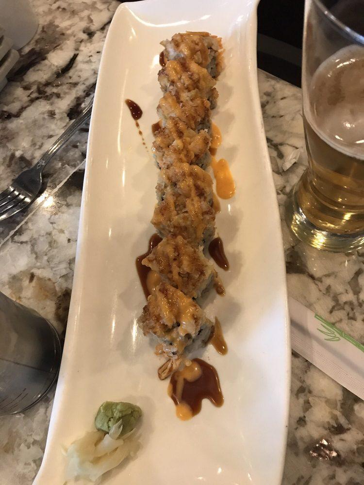 Oklahoma Roll · Spicy crab meat, cucumber on the inside, shrimp tempura, avocado with eel sauce, spicy mayo on the outside. Fully cooked.