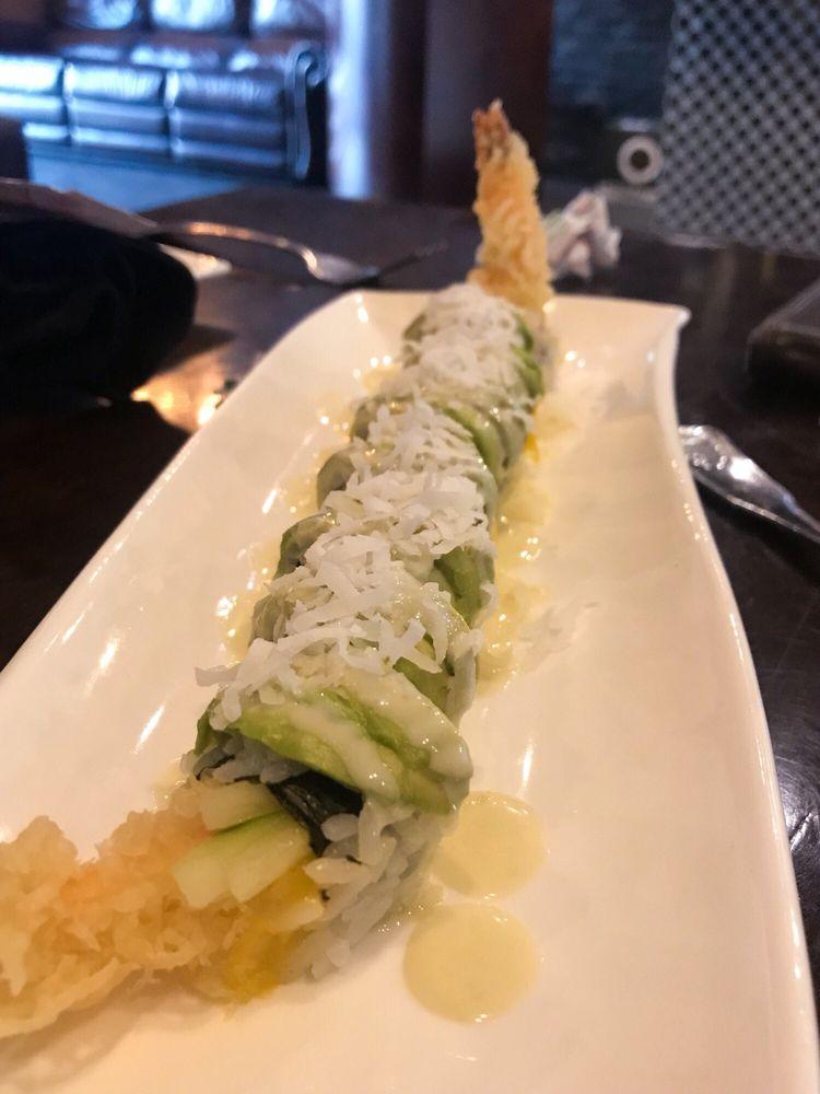 White Swan Roll · Tempura shrimp, mango, cucumber on the inside, avocado with coconut, wasabi mayo and coconut crunch on the outside. Fully cooked.