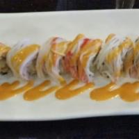 Spicy Cowboy Roll · Shrimp tempura on the inside, crabmeat and spicy mayo on the outside. Fully cooked.