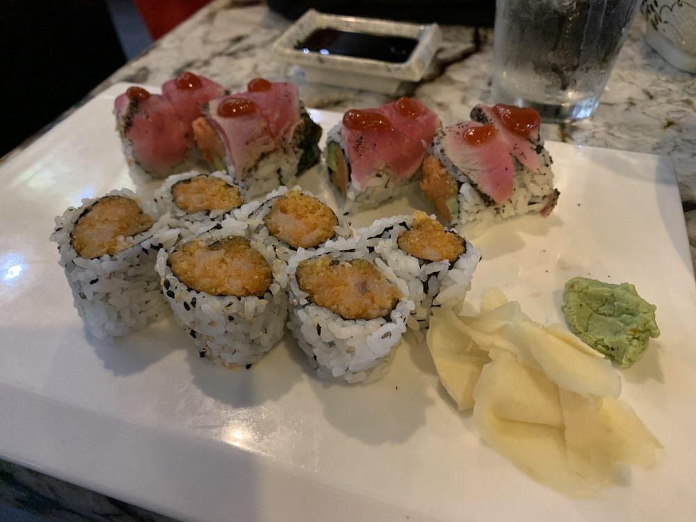 Red Devil Roll · Spicy tuna crunch and avocado on the inside, pepper tuna with Sriracha and coconut wasabi on the outside.