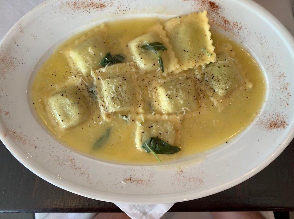 Ravioli · Homemade spinach and ricotta cheese ravioli in a butter and sage sauce.