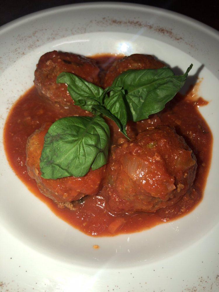 Polpettine · Slowly cooked meatballs in tomato sauce from our brick oven.