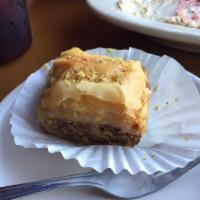 Baklava · A traditional dessert made in house from filo dough, walnuts, cinnamon, and rose water.