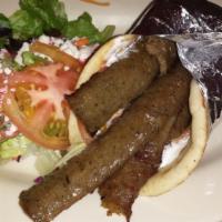 Gyros Wrap · A combination of ground beef and lamb slowly roasted over a vertical pit and thinly sliced; ...