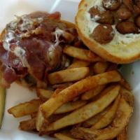 Flamin' Moo Burger · On a kaiser bun with pepper Jack cheese, bacon, grilled onions, ranch dressing and sliced ja...