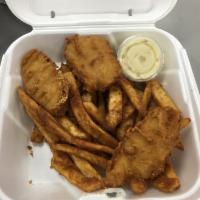 Fish and Chips · Beer battered cod fish, served with tartar sauce and your choice of regular or battered frie...