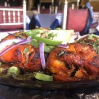 Tandoori Chicken · Chicken marinated and roasted over charcoal.