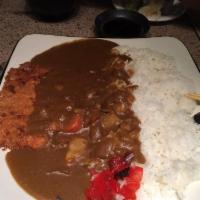 Katsu Curry · Japanese style mid-spicy curry with choice of chicken or pork breaded and fried on the side....