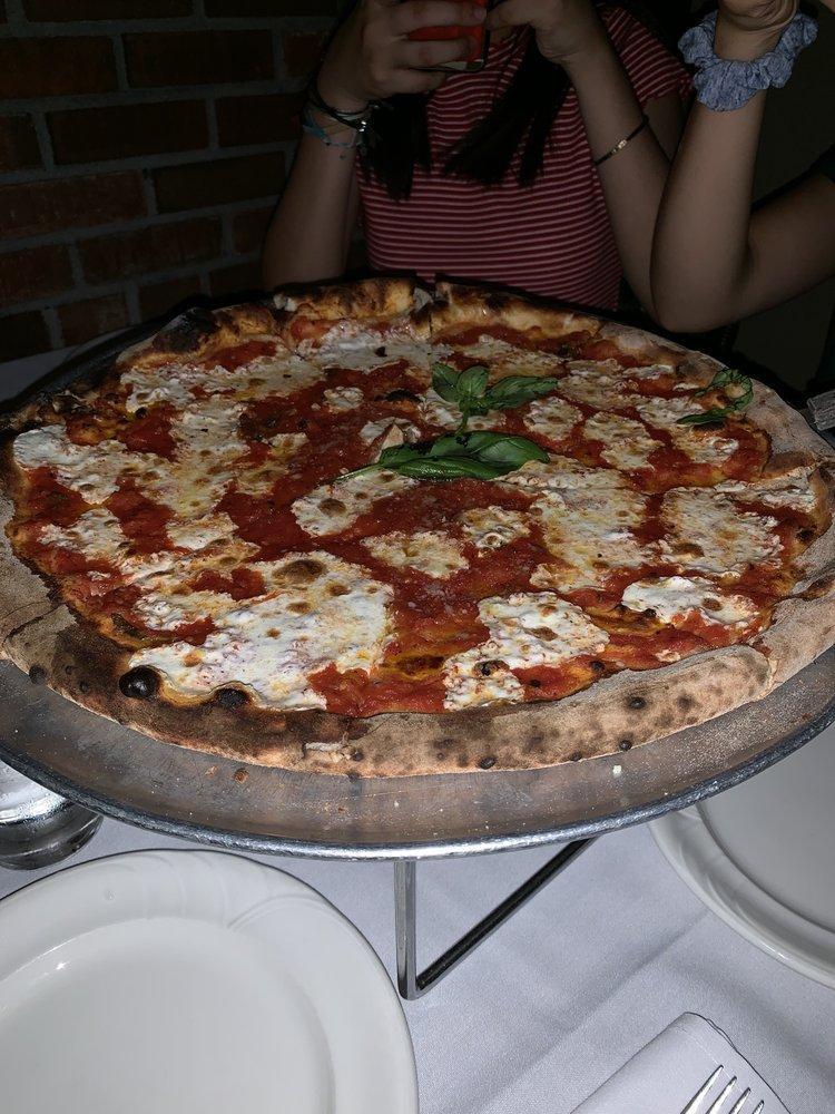 Margherita Pizza · Tomato, mozzarella and basil.