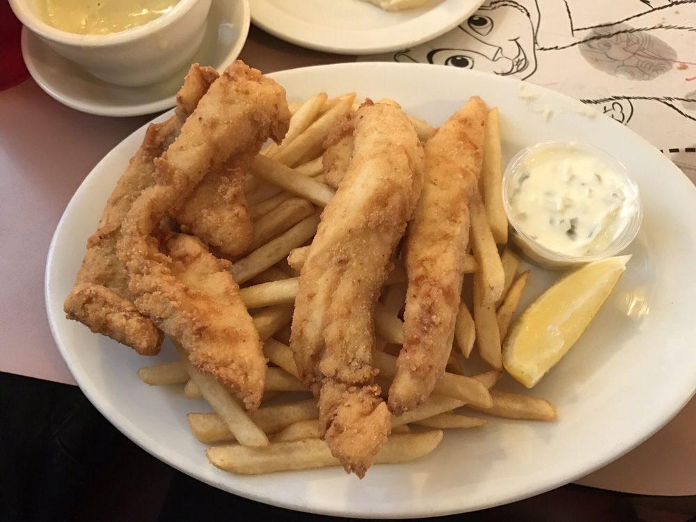 Fish & Chips · Lightly home breaded and fried. Served with fries and a choice of soup, tossed salad or coleslaw.