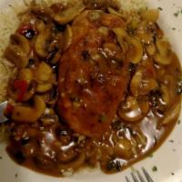 Chicken Marsala · Sauteed with scallions and mushrooms in a Marsala wine sauce.