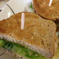 Tuna Melt · White albacore tuna seasoned with olive oil, lemon and spices, melted Swiss cheese, topped w...