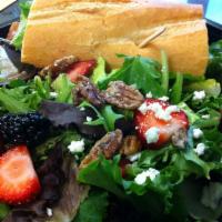 1/2 Sandwich and 1/2 Salad Combo · Includes choice of half sandwich and half salad.