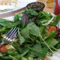 Greek Salad · Mixed green, tomatoes, cucumbers, red onions, Kalamata olives, feta cheese and Greek dressing.