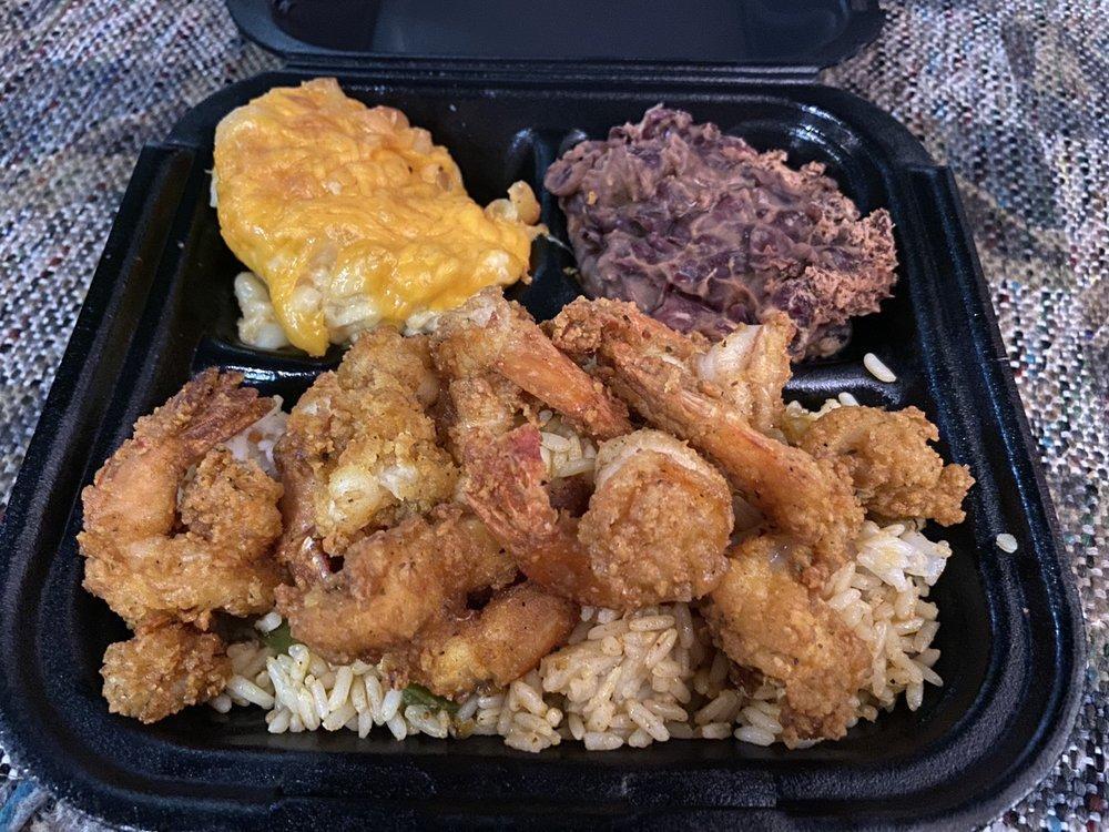 Fried Shrimp Combo · Comes w/ Cajun rice & your choice of two sides