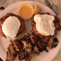 Crab Cake Benedict · Poached eggs, Cajun crab cakes and hollandaise sauce.