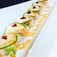 Dragon · California roll topped with freshwater eel, avocado, and smelt egg, served with eel sauce.