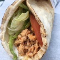 Lula Kabob Wrap · Grilled ground beef with a special blend of seasonings, topped with onions, lettuce, tomatoe...