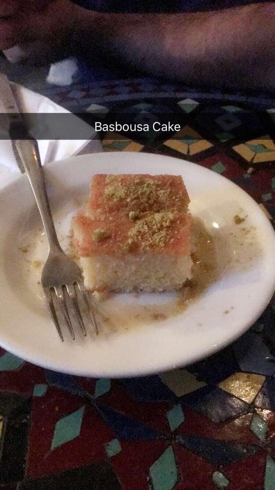 Basbousa · Honey cake made with semolina flour and rose water, drizzled with honey and pistachio.