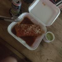 Wet Burrito · Your choice of meat, beans, and rice, topped with a special red sauce, with melted cheese, s...