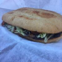 Torta · Mexican sandwich your choice of meat, butter, beans, mayonnaise, jalapenos, grilled onions, ...
