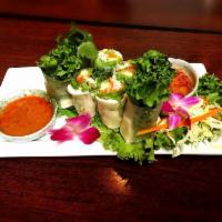 Crispy Spring Rolls · Deep-fried crispy rolls wrapped with cabbage, carrot, silver noodle, fresh corn, taro egg, s...