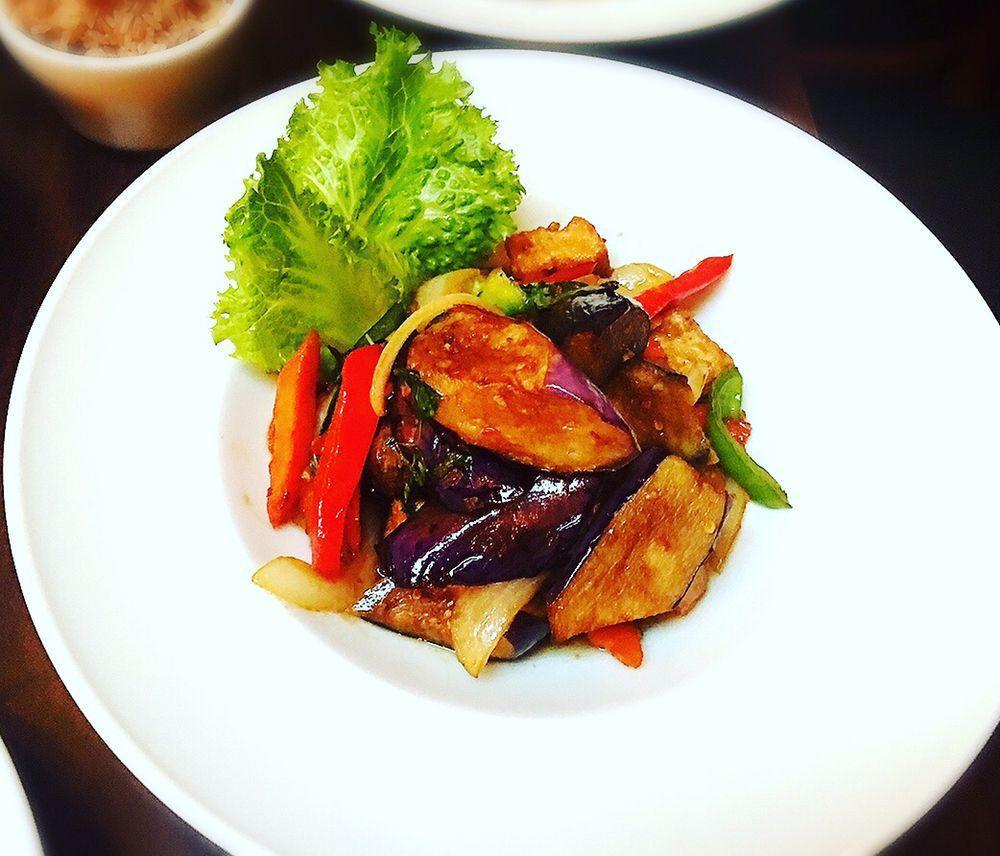 Basil Eggplant Sauteed · Sauteed eggplant with your choice of meat, bell peppers, zucchini, mushrooms and sweet basil in fresh garlic chili black bean sauce.
