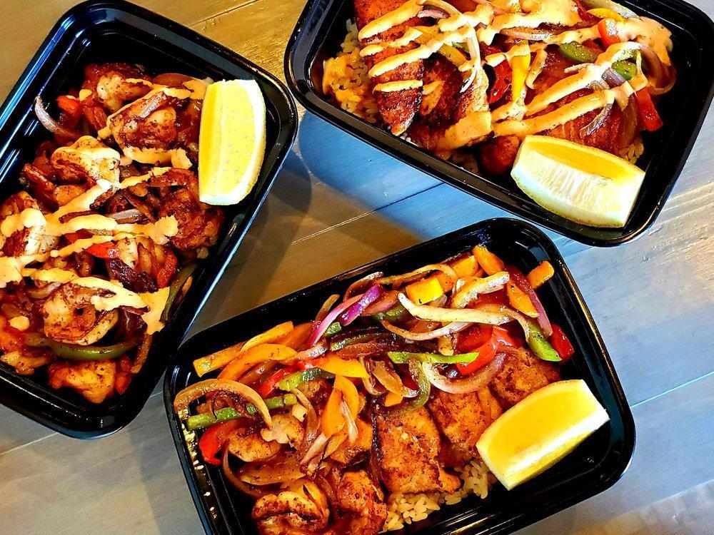 Fish and Shrimp Combo Meal · Includes 2 sides.
