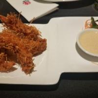 Coconut Shrimp · With citrus honey mustard dip.
