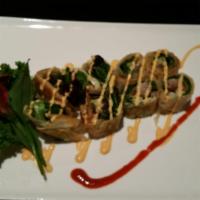 Crispy Duck Roll · Mixed greens, duck strips wrapped with pancake.
