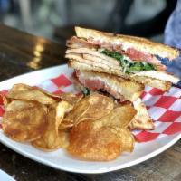 Southern Belle · Smoked turkey breast, smoked thick-cut bacon, melted Swiss cheese, market fresh tomato, brai...