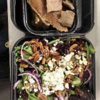 Tigris Salad · Spring mixed greens, dried cranberries, red onion, candied pecans and crumbled blue cheese w...