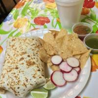 Carne Asada Burrito · Grilled lean steak with black or pinto beans, rice, Jack cheese, sour cream, guacamole, and ...