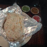 Adobada Burrito · Grilled marinated pork with black or pinto beans, rice, Jack cheese, sour cream, guacamole, ...
